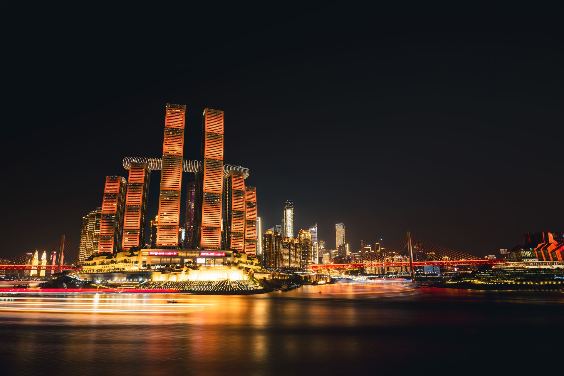 Chongqing’s illuminated riverside skyline at night
